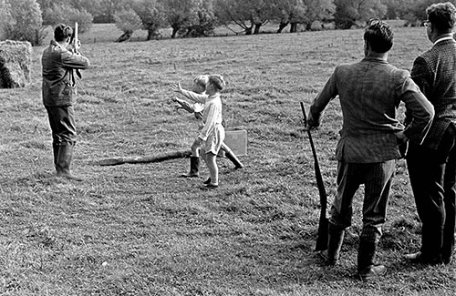 Boys ask for cartridge cases, clay pigeon shoot Worcs,  (1967)