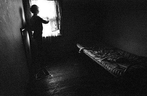 Mrs P's son in his bedroom, All Saints, Birmingham  (1968)