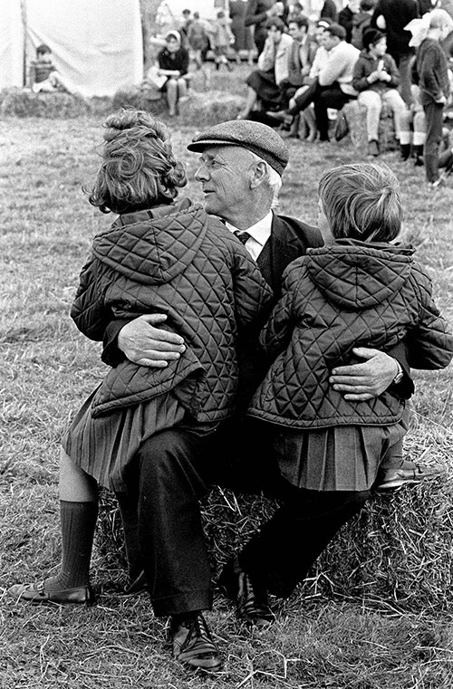 Grandfather and his grandchildren, agricultural show, Bromsgrove Worcs  (1967)