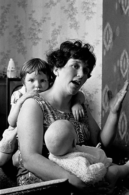 Mother and her family living in a Birmingham slum property,  (1969)